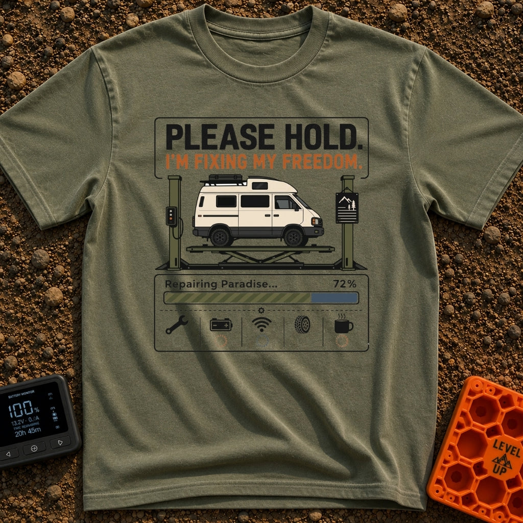 Fixing My Freedom - T-Shirt in Moss - A white camper van is shown elevated on a green auto lift beneath the text "PLEASE...