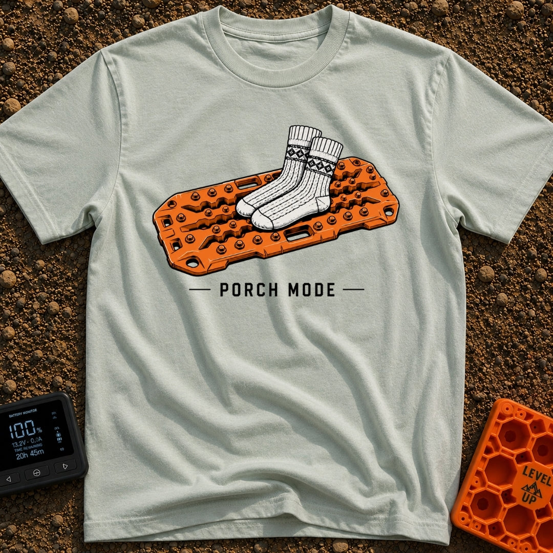 Sliding Into Porch Mode - T-Shirt in Bay - An illustration of a pair of thick, patterned knit socks resting on top of an...