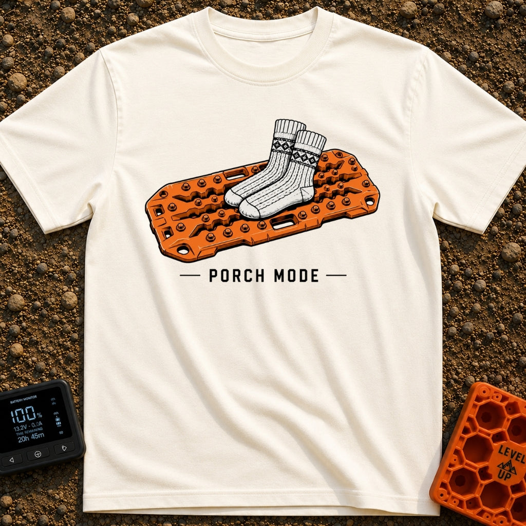 Sliding Into Porch Mode - T-Shirt in Ivory - An illustration of a pair of thick, patterned knit socks resting on top of...