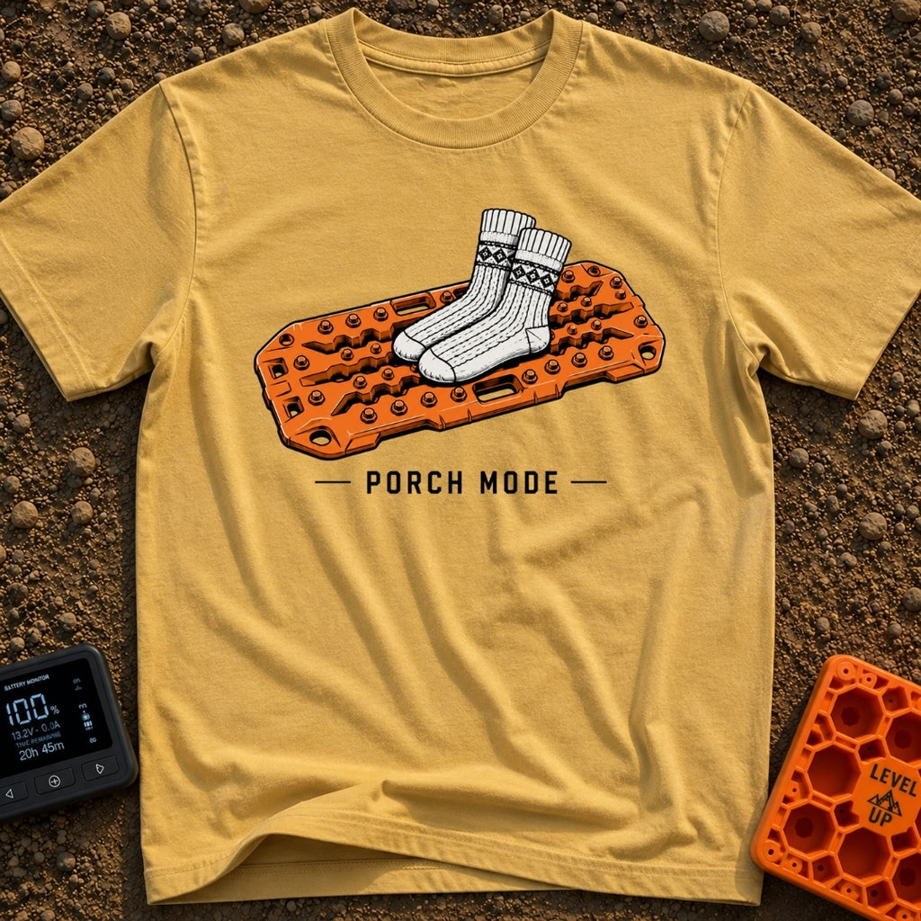 Sliding Into Porch Mode - T-Shirt in Mustard - An illustration of a pair of thick, patterned knit socks resting on top of...