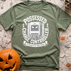 Ghost In The Grid - T-Shirt in Moss - A detailed illustration of an MPPT solar charge controller mounted on wood,...