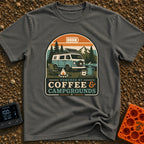 Caffeine And Campgrounds - T-Shirt in Pepper - An illustration of a retro camper van parked in a forest with a solar...