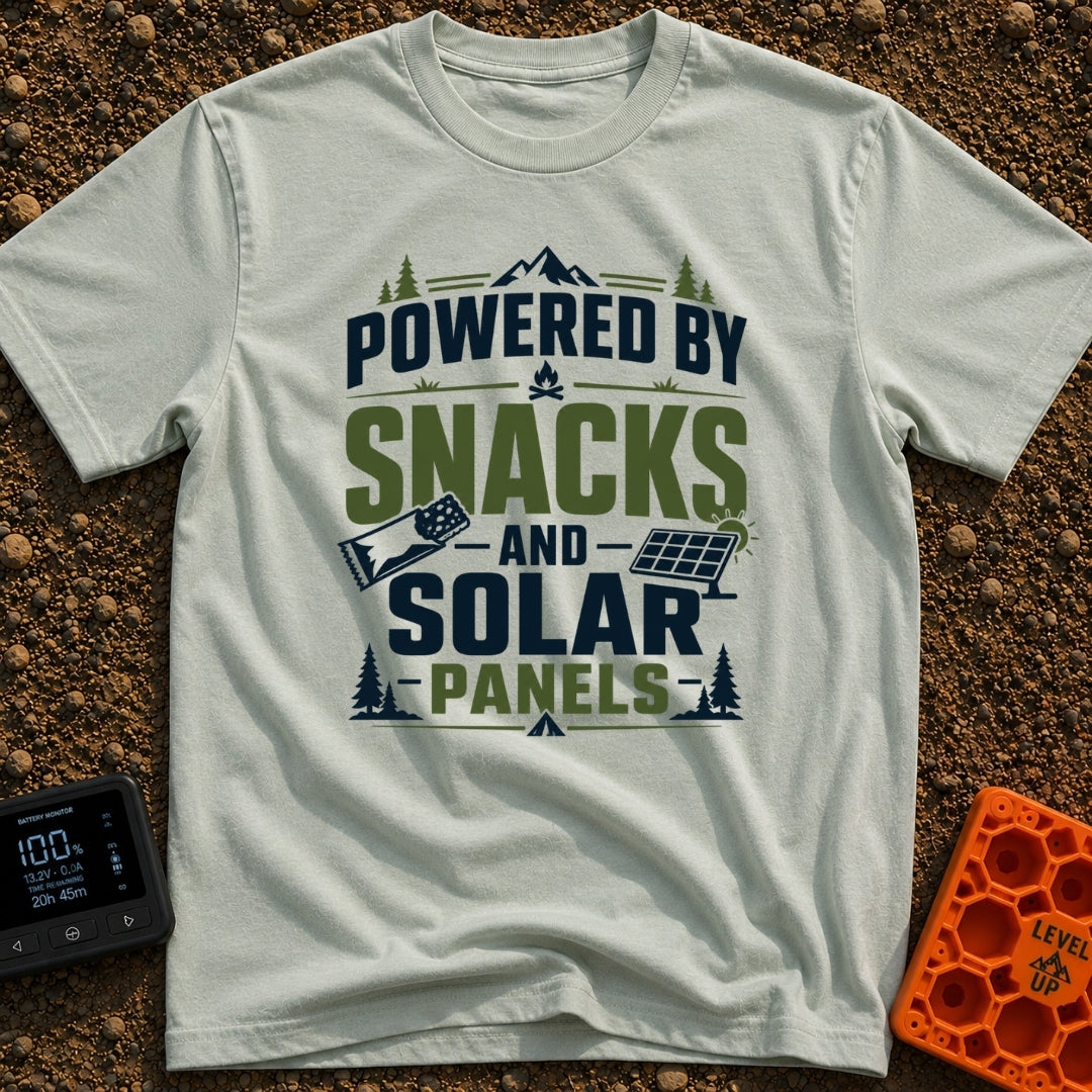 Snacks And Solar Powered - T-Shirt in Bay - A typographic design featuring the text "POWERED BY SNACKS AND SOLAR PANELS"...