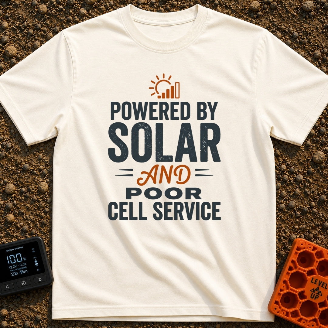 No Bars All Solar - T-Shirt in Ivory - A typographic design featuring the text "POWERED BY SOLAR AND POOR CELL SERVICE"...