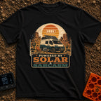 Solar and Sarcasm - T-Shirt in Black - A camper van with roof-mounted solar panels is parked in a desert landscape...