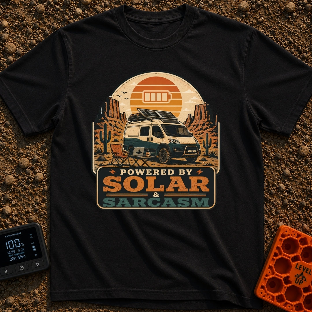 Solar and Sarcasm - T-Shirt in Black - A camper van with roof-mounted solar panels is parked in a desert landscape...