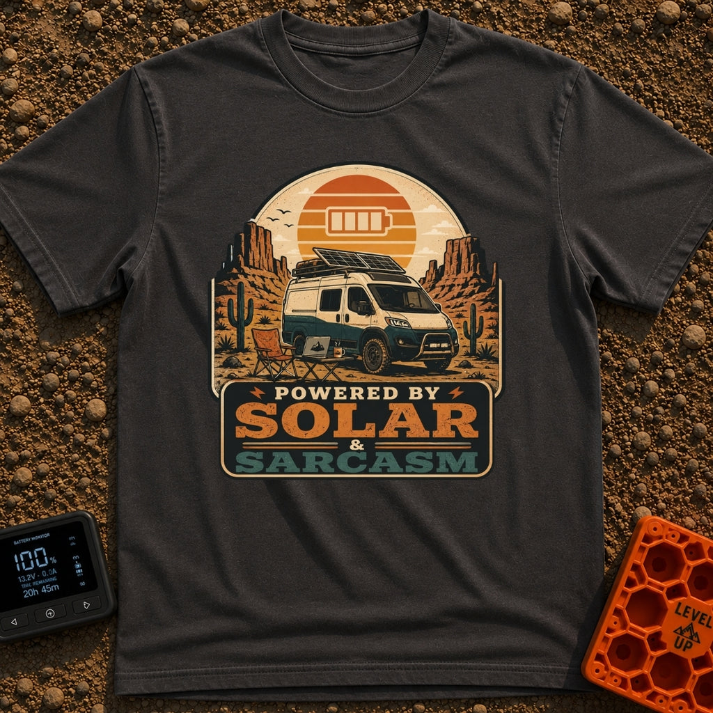 Solar and Sarcasm - T-Shirt in Graphite - A camper van with roof-mounted solar panels is parked in a desert landscape...