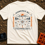 Solar Tech Nomad - T-Shirt in Ivory - A stylized graphic featuring a mountain landscape with pine trees and an orange...