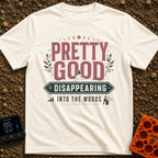 Pretty Good At Disappearing - T-Shirt in Ivory - Typography art reading "PRETTY GOOD DISAPPEARING INTO THE WOODS"...