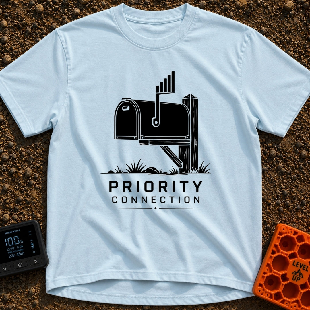 Priority Mail Connection - T-Shirt in Chambray - A black and white illustration of a classic roadside mailbox on a wooden...