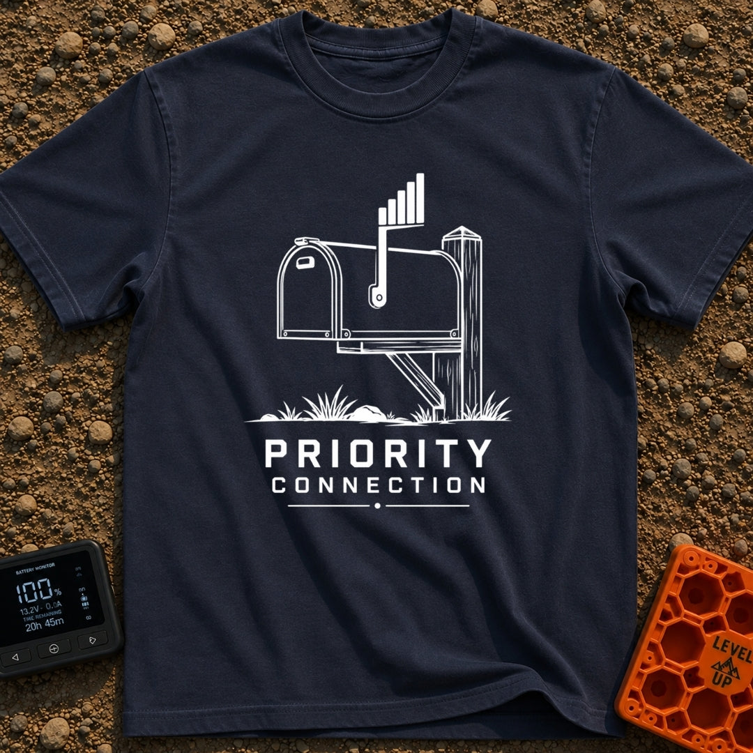 Priority Mail Connection - T-Shirt in Navy - A black and white illustration of a classic roadside mailbox on a wooden...