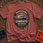 Pro Campsite Adjuster - T-Shirt in Brick - A circular badge graphic showing a camper van parked in front of mountains,...