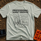 Campsite Connoisseur Club - T-Shirt in Bay - A line drawing of a person sitting in a camp chair looking at the sun...