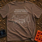 Reverse Parking Pro - T-Shirt in Espresso - White line art drawing of a camper van reversing into a campsite at night,...