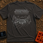 Reverse Parking Pro - T-Shirt in Graphite - White line art drawing of a camper van reversing into a campsite at night,...