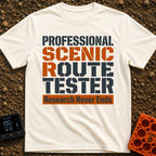 Scenic Route Maven - T-Shirt in Ivory - A text-only design featuring the phrase "PROFESSIONAL SCENIC ROUTE TESTER" in...