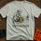 Panning For Signal - T-Shirt in Bay - A black and white illustration of a gold prospector squatting by a stream, holding...