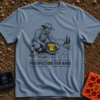 Panning For Signal - T-Shirt in Blue Jean - A black and white illustration of a gold prospector squatting by a stream,...