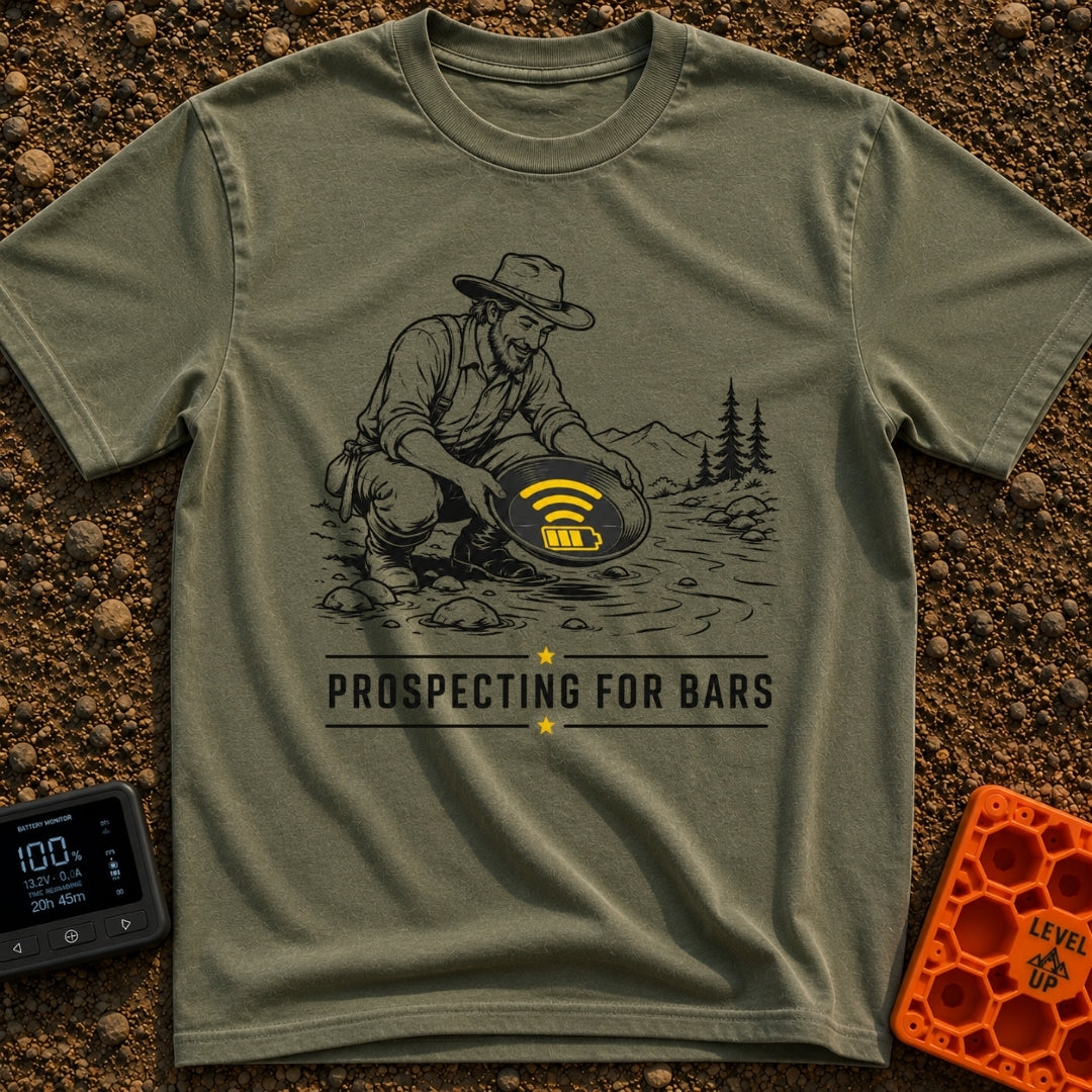 Panning For Signal - T-Shirt in Moss - A black and white illustration of a gold prospector squatting by a stream, holding...