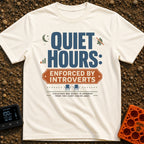 Silence Enforced By Introverts - T-Shirt in Ivory - A typographic design reading "QUIET HOURS: ENFORCED BY INTROVERTS"...