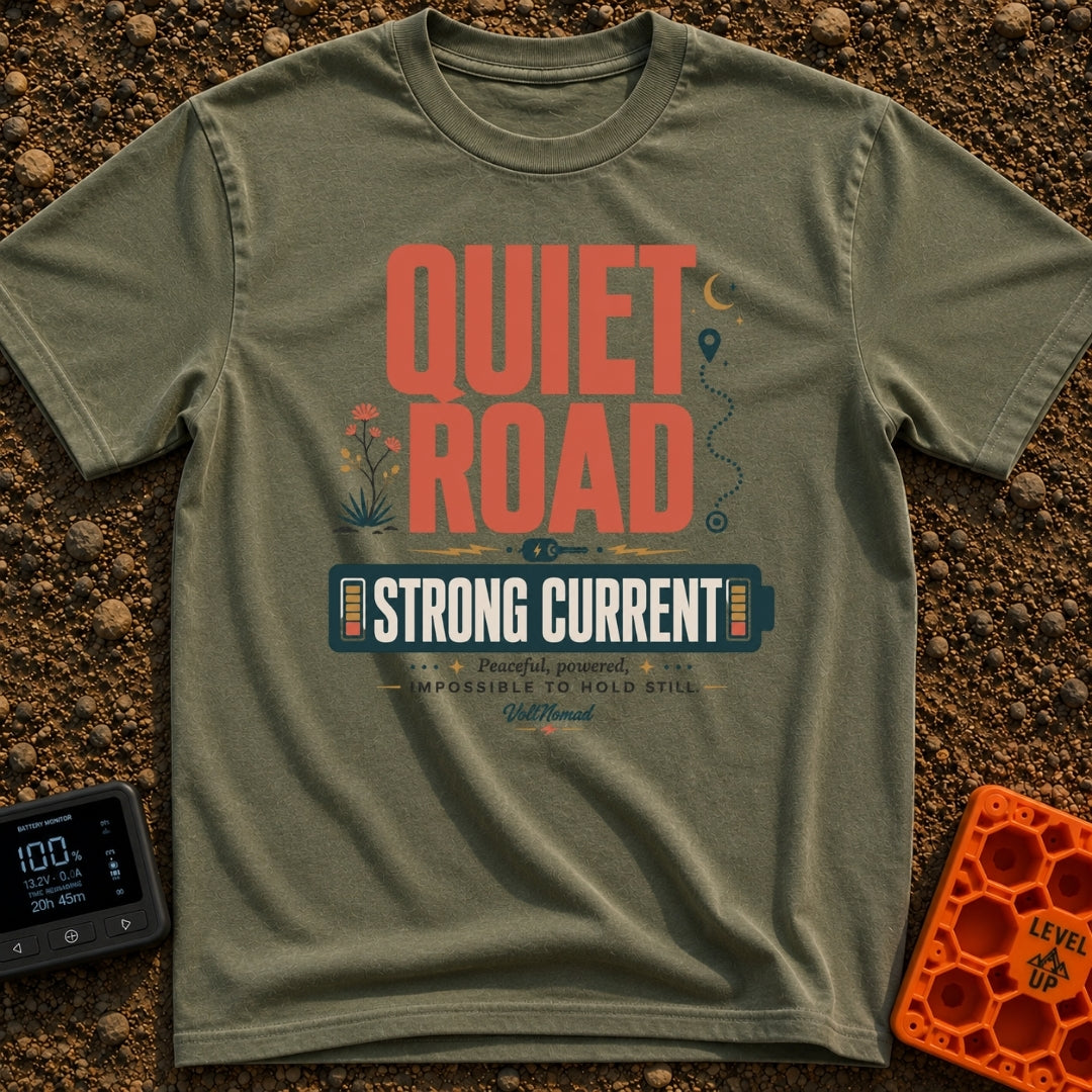 Power To The Peaceful - T-Shirt in Moss - The design features large retro typography reading "QUIET ROAD" above a battery...