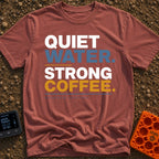Still Waters Strong Brew - T-Shirt in Brick - A text-based design featuring the stacked words "QUIET WATER." and "STRONG...