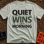 Quiet Wins Mornings - T-Shirt in Bay - A typographic design featuring the stacked phrase "QUIET WINS THE MORNING" in bold...
