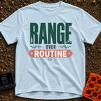 Roam Over Routine - T-Shirt in Chambray - Typographic design featuring the large green word "RANGE" with a pine tree and...