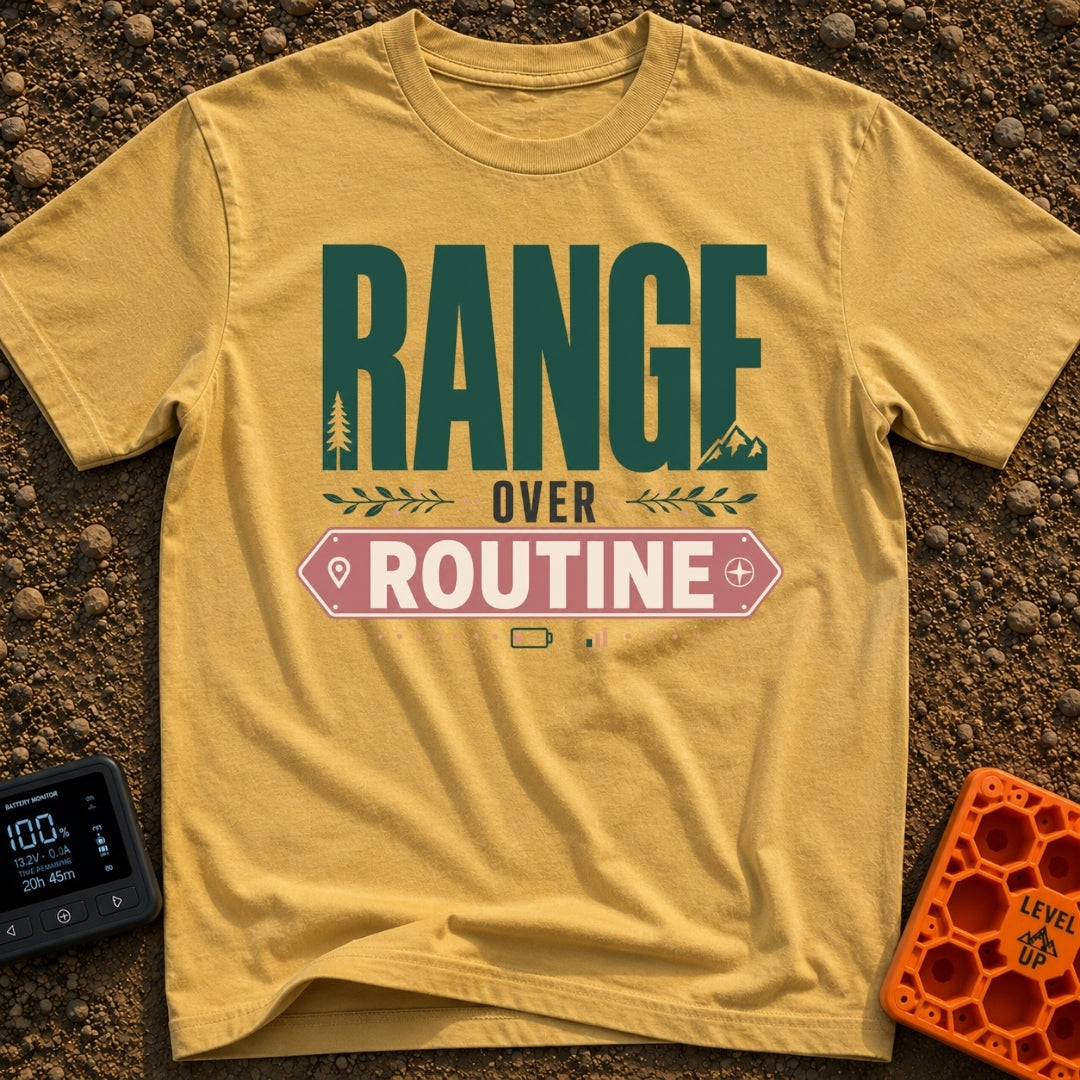 Roam Over Routine - T-Shirt in Mustard - Typographic design featuring the large green word "RANGE" with a pine tree and...
