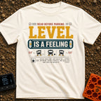 Level Is A Feeling - T-Shirt in Ivory - A graphic design featuring the text "READ BEFORE PARKING: LEVEL IS A FEELING"...