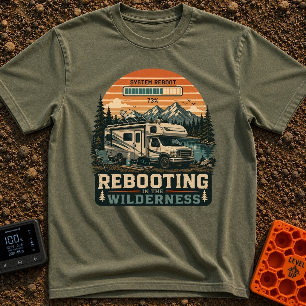 Off Grid Reboot - T-Shirt in Moss - An illustration of an RV parked by a mountain lake, equipped with roof-mounted solar...