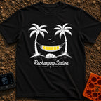 Unplug To Recharge - T-Shirt in Black - A black and white illustration of two palm trees with a hammock strung between...