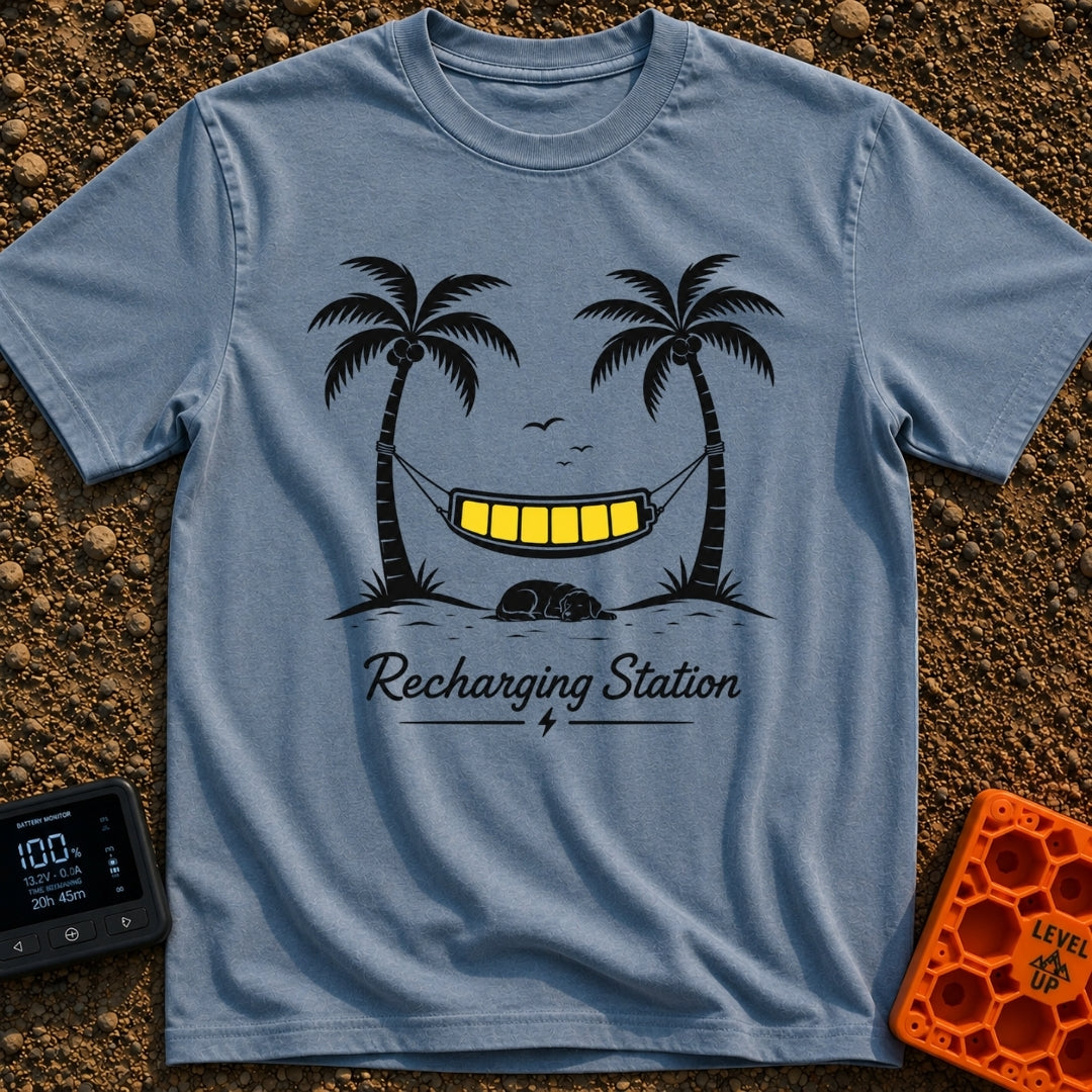 Unplug To Recharge - T-Shirt in Blue Jean - A black and white illustration of two palm trees with a hammock strung...