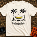 Unplug To Recharge - T-Shirt in Ivory - A black and white illustration of two palm trees with a hammock strung between...