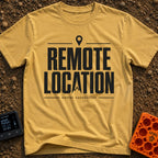 Working From Nowhere - T-Shirt in Mustard - Text reading 'REMOTE LOCATION' in large black letters with the 'A' stylized...