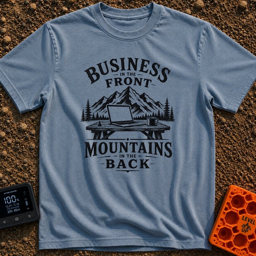 Working From Roam - T-Shirt in Blue Jean - A black and white illustration of an open laptop and a mug sitting on a wooden...
