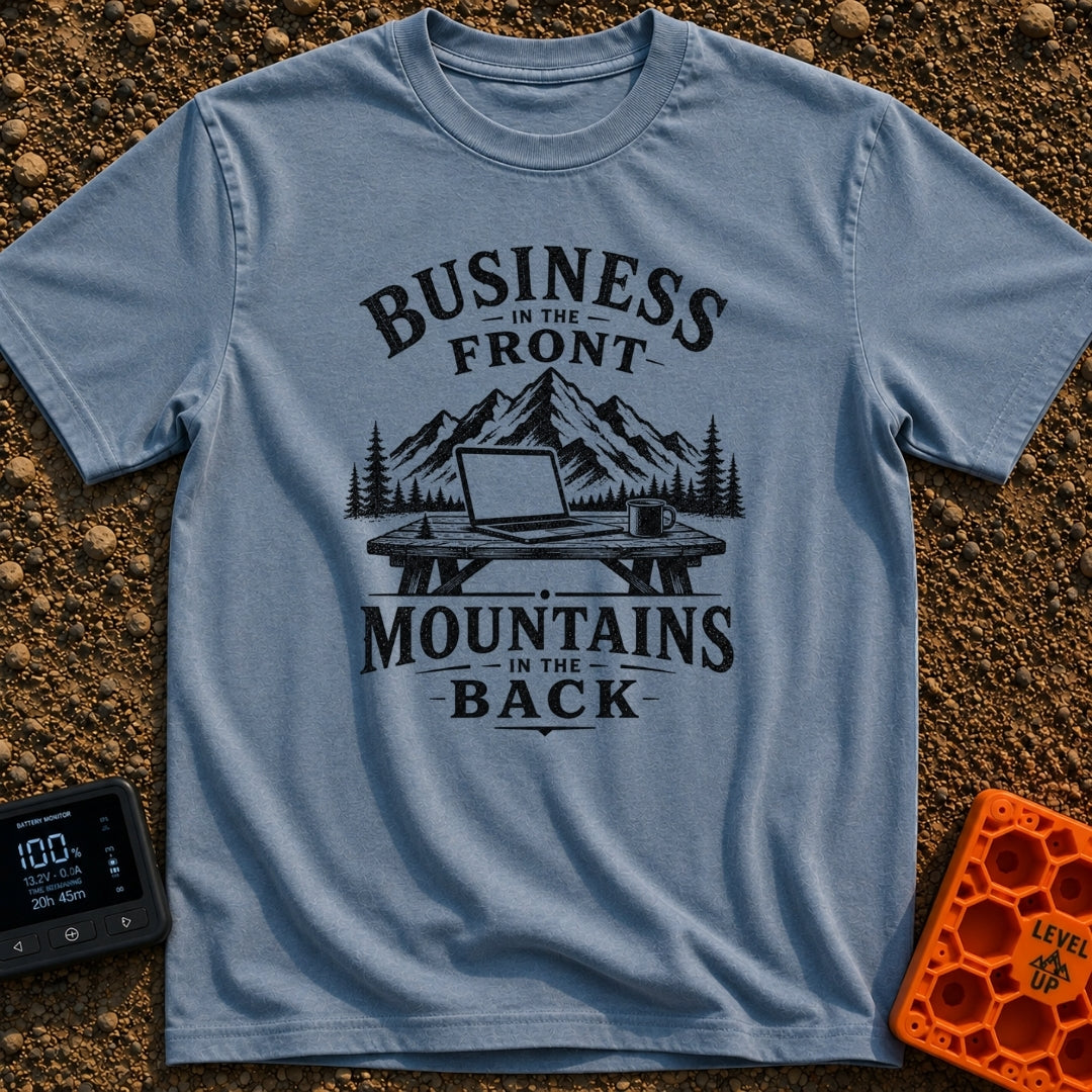 Working From Roam - T-Shirt in Blue Jean - A black and white illustration of an open laptop and a mug sitting on a wooden...
