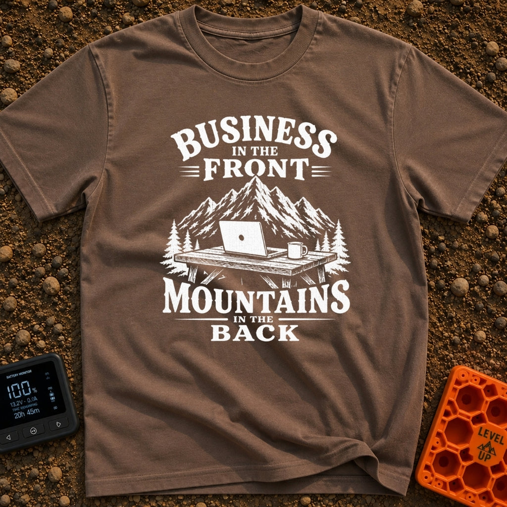 Working From Roam - T-Shirt in Espresso - A black and white illustration of an open laptop and a mug sitting on a wooden...