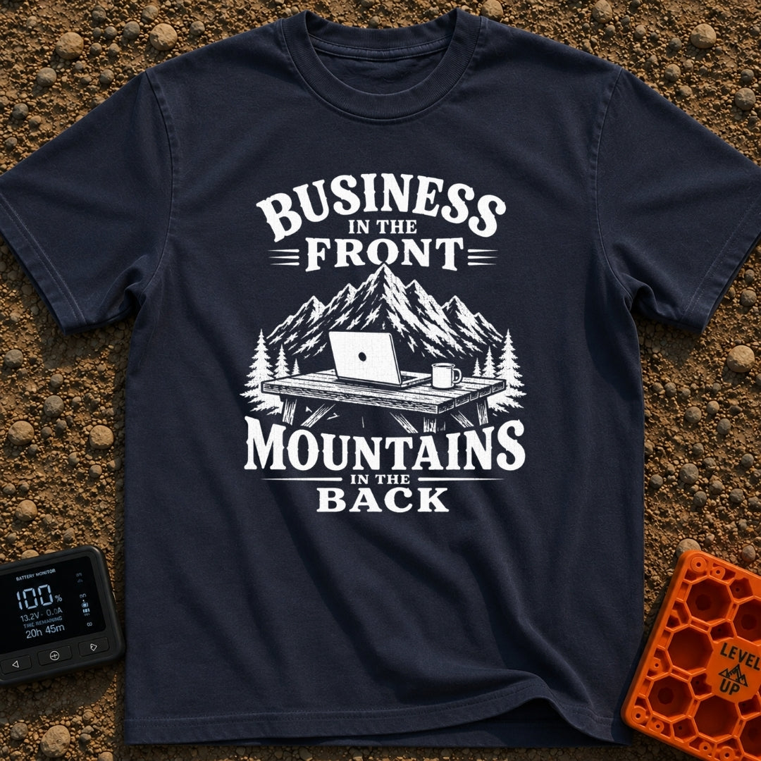Working From Roam - T-Shirt in Navy - A black and white illustration of an open laptop and a mug sitting on a wooden...