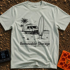 External Surf Drive - T-Shirt in Bay - A black and white illustration of a camper van parked on a beach with palm trees...