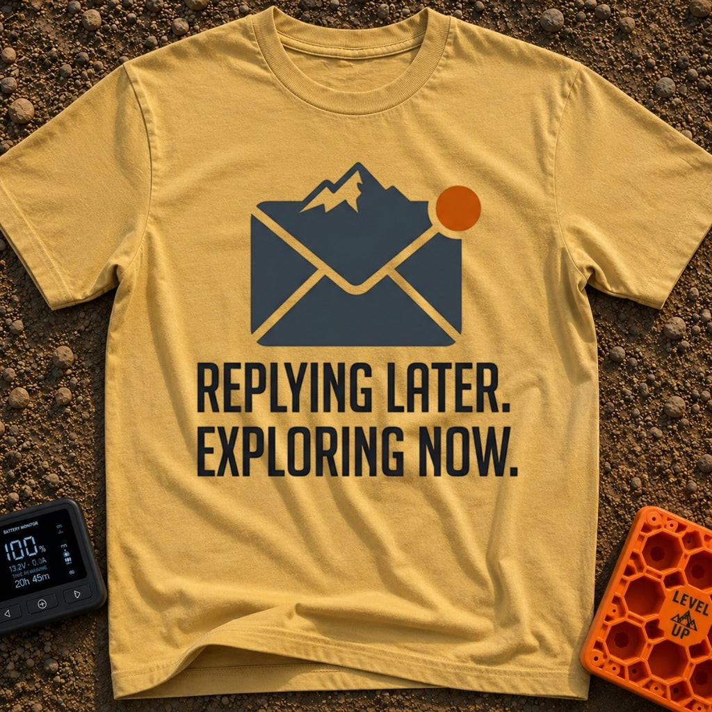 Reply Later Explore Now - T-Shirt in Mustard - A graphic of a dark grey email envelope where the top flap is shaped like...