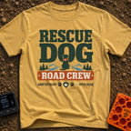 Rescue Road Crew - T-Shirt in Mustard - A graphic featuring the text 'RESCUE DOG' above a silhouette of a dog wearing a...