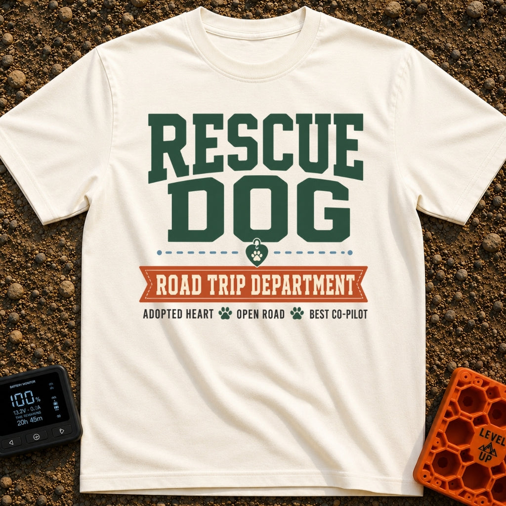 Doggo Road Crew - T-Shirt in Ivory - A typographic design with large green text reading 'RESCUE DOG' above a heart-shaped...