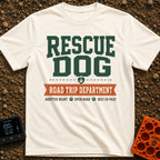 Doggo Road Crew - T-Shirt in Ivory - A typographic design with large green text reading 'RESCUE DOG' above a heart-shaped...