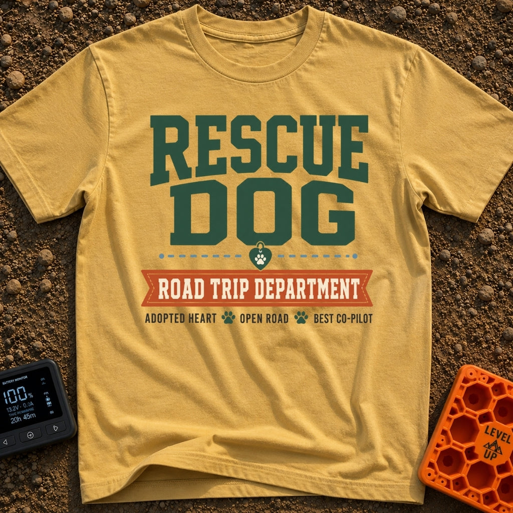Doggo Road Crew - T-Shirt in Mustard - A typographic design with large green text reading 'RESCUE DOG' above a...
