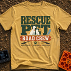 Rescue Road Crew - T-Shirt in Mustard - The design features the text "RESCUE PET" in large green letters with silhouettes...