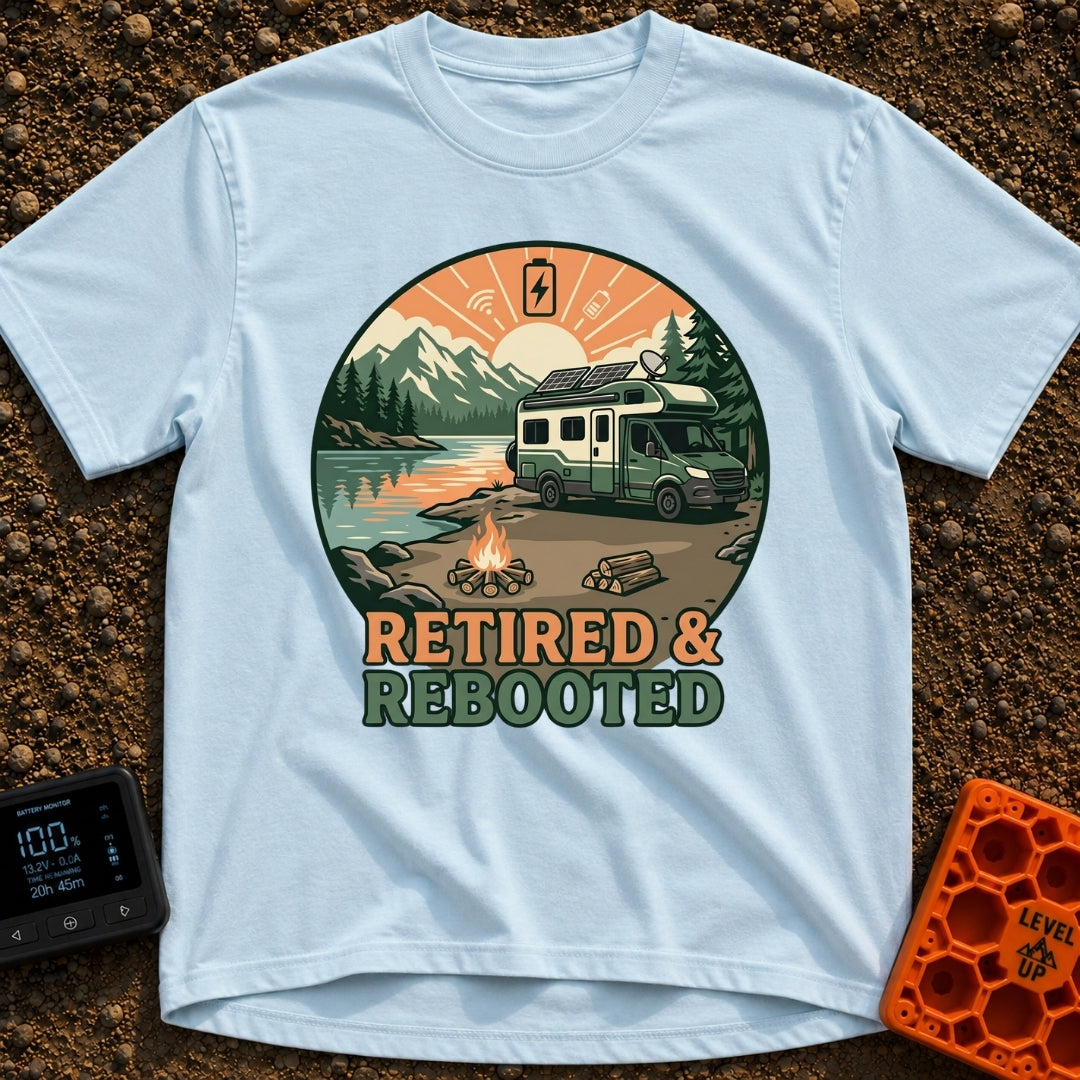 Retired and Rebooted - T-Shirt in Chambray - A circular illustration of a green and white RV parked beside a mountain...