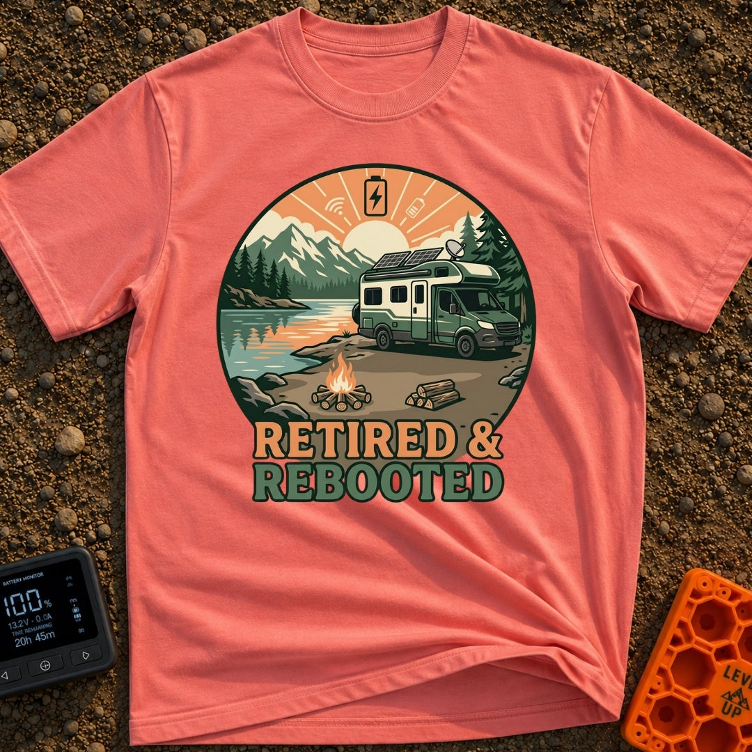 Retired and Rebooted - T-Shirt in Watermelon - A circular illustration of a green and white RV parked beside a mountain...