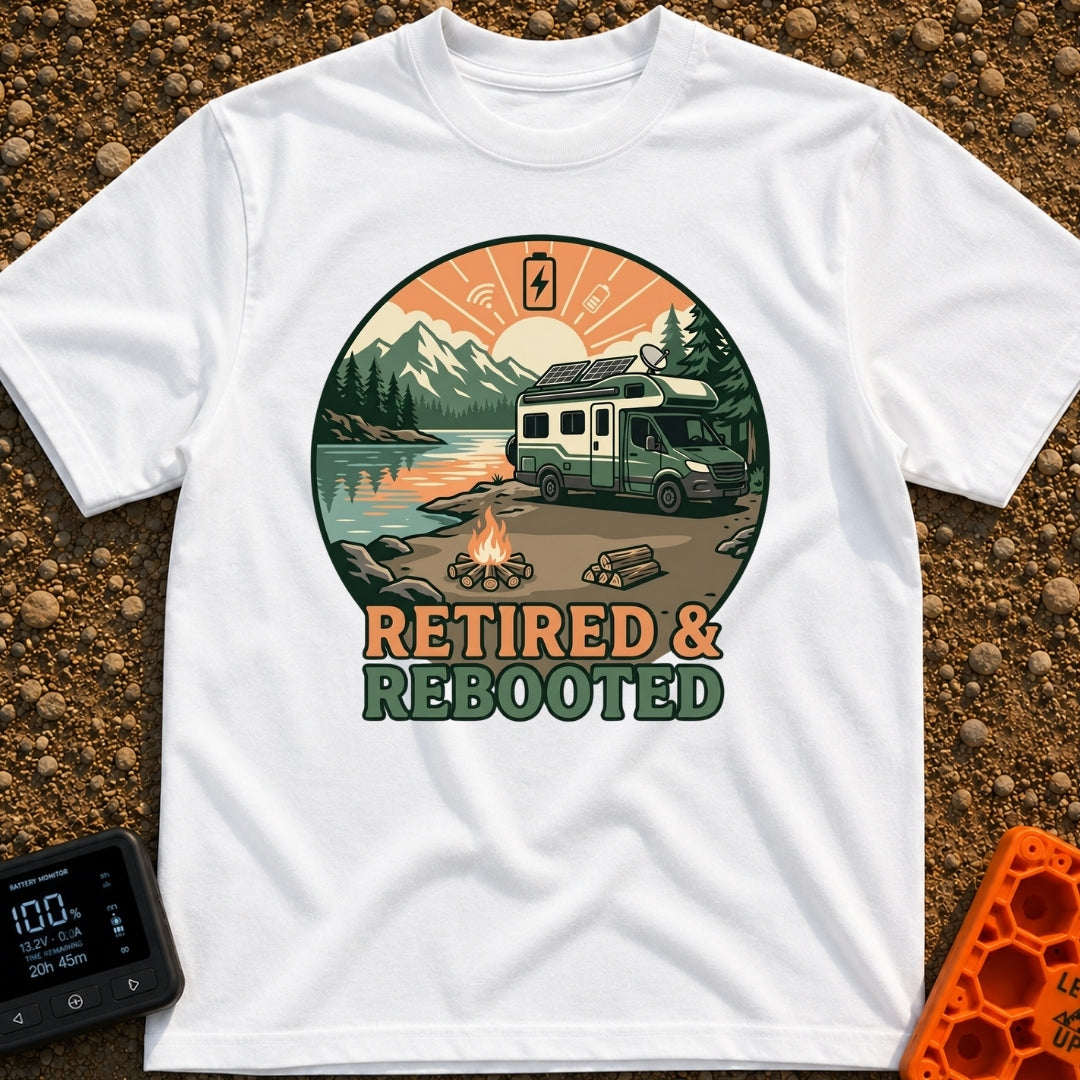 Retired and Rebooted - T-Shirt in White - A circular illustration of a green and white RV parked beside a mountain lake...