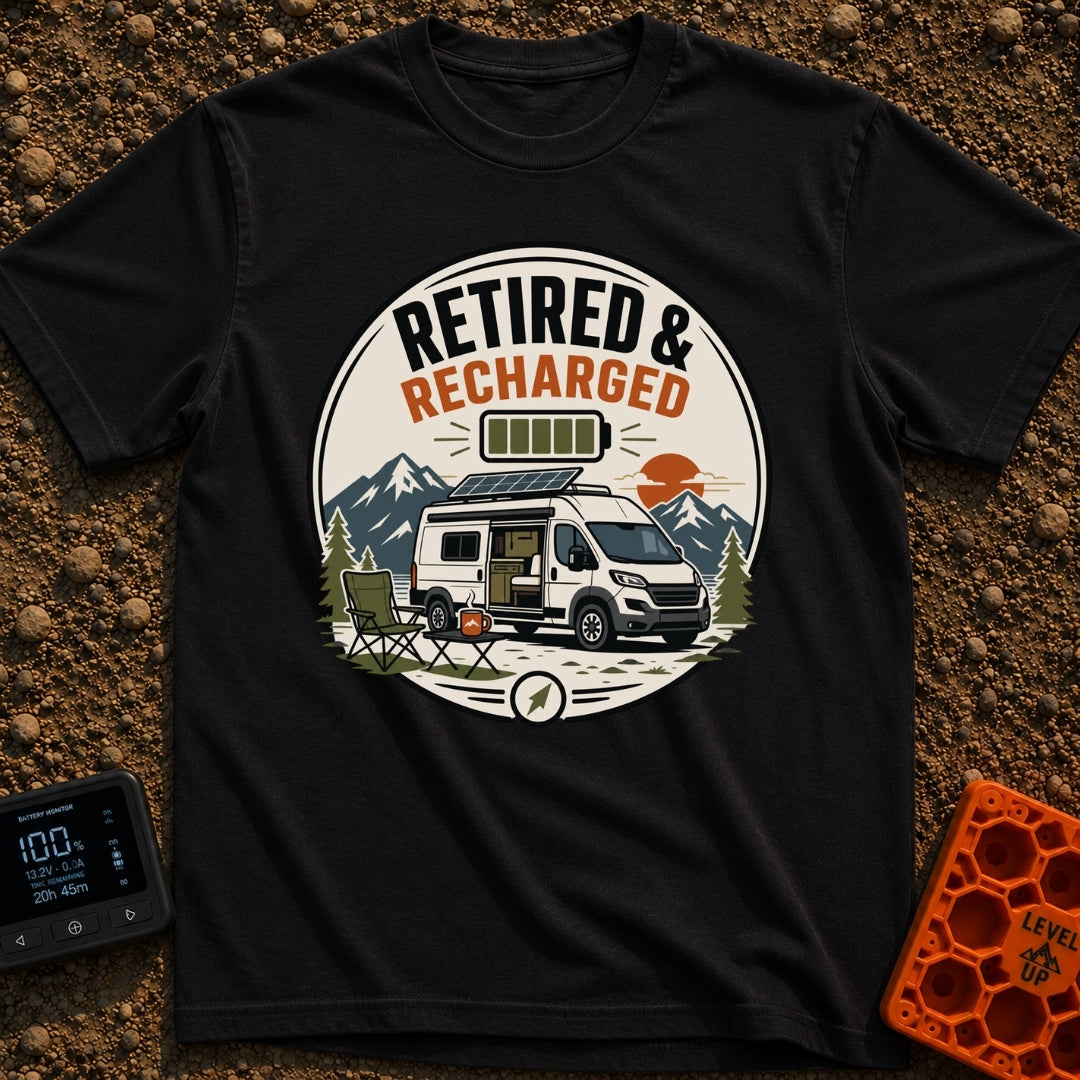 Recharged on Wheels - T-Shirt in Black - A circular badge illustration of a white camper van with a roof solar panel and...